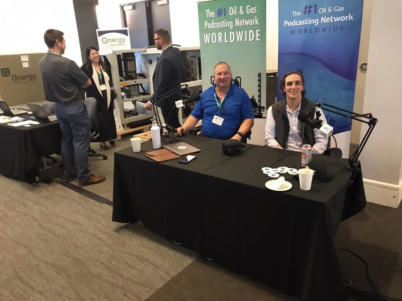 Matthew Bertram recording the Oil & Gas Sales & Marketing podcast on Podcast Row at an energy expo